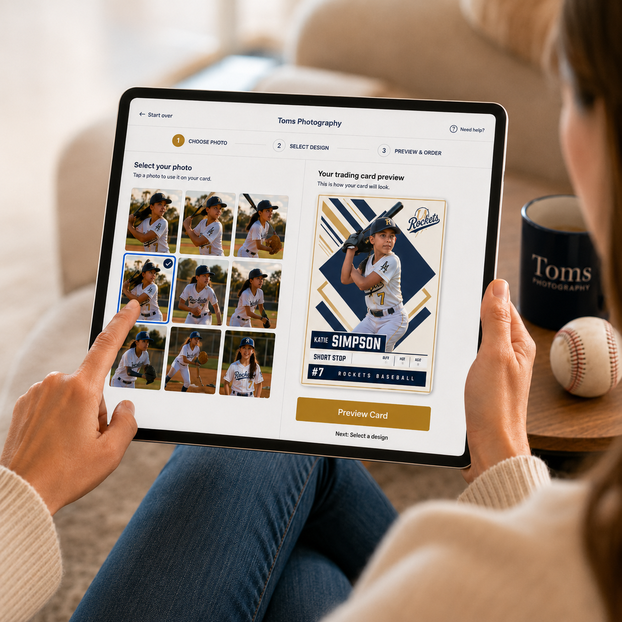 A parent on a phone choosing a photo of their child and previewing the personalized trading card.